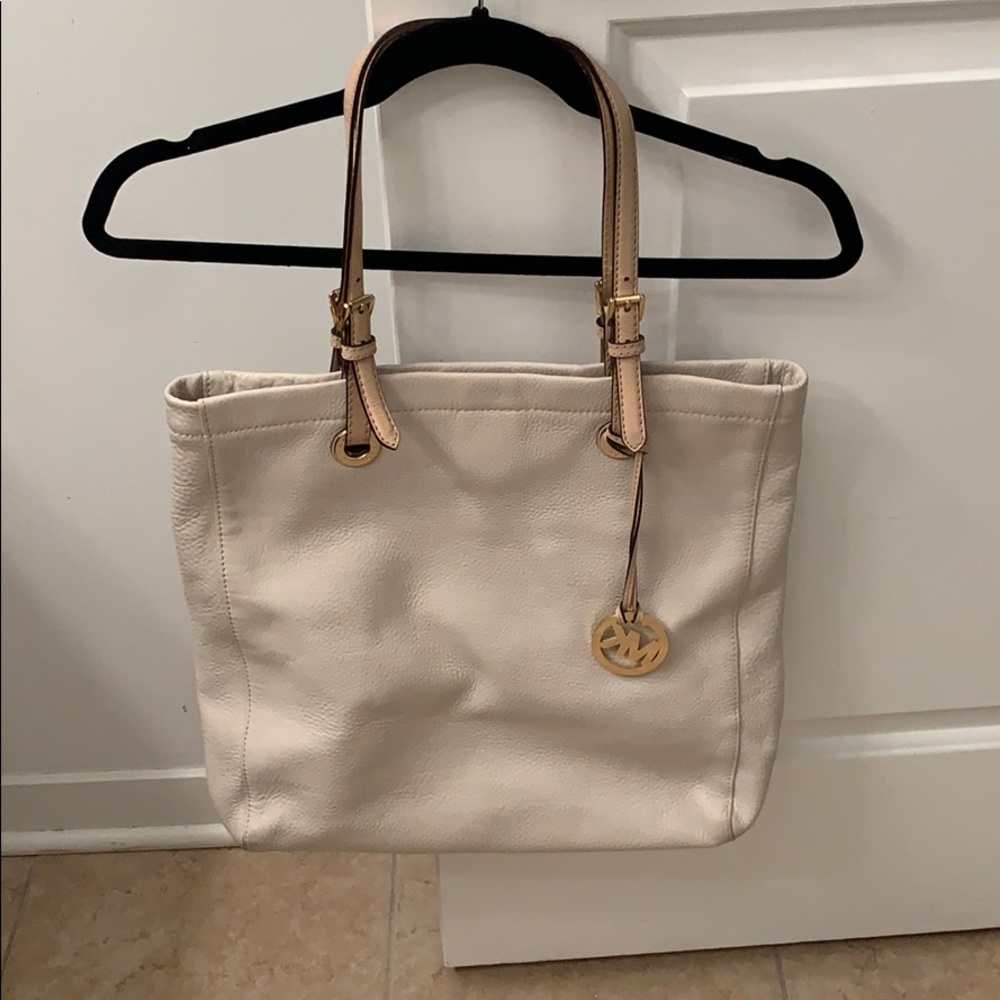 Cream color leather Michael Kors bucket type bag